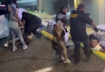 Dude Gets Body-Slammed on Parking Block After Spitting on Security Guard